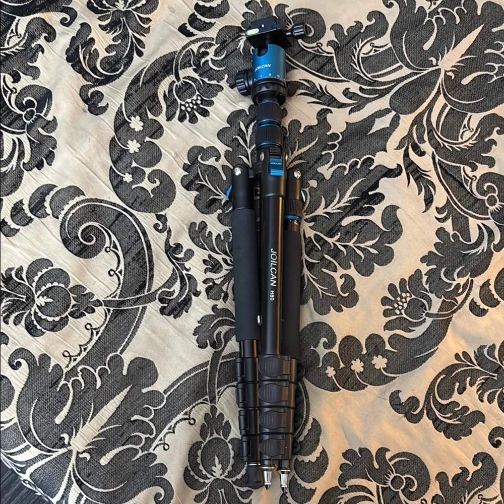 Versatile Black and Blue Tripod for Photography